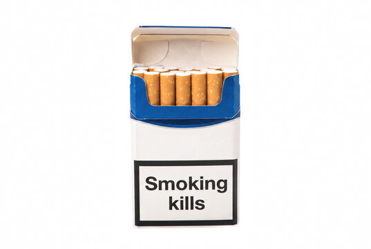 Open pack of cigarettes with smoking kills warning label