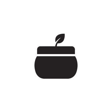 Elegant black silhouette icon of a natural cream jar with a delicate leaf, representing organic skincare solutions, sustainable beauty practices, and plant-based wellness concepts