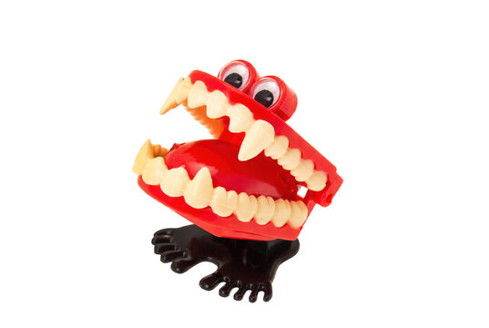 Wind up chattering teeth joke toy with googly eyes