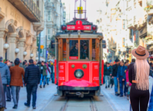 Nostalgic retro red tram on famous Istiklal street. Istiklal Street is a popular tourist destination in Istanbul.
