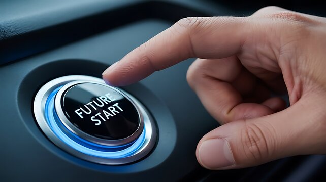 Close up of a human finger pressing a glowing start button labeled future start on a dark modern car dashboard interior control panel interface