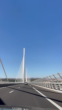 cable car bridge. View of the Viaduct Bridge in Millau. Cable-stayed bridge in France. Traffic movement across the bridge.