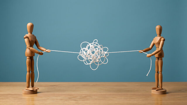 Navigating communication challenges A visual metaphor of tangled dialogue and misunderstanding between two parties