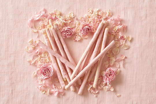 Heart Shaped Pink Biscuit Sticks with Romantic Floral Decoration