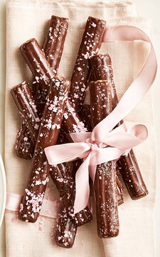 Chocolate Covered Biscuit Sticks Tied with Pink Ribbon