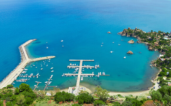 Aerial view of a picturesque bay with a yacht harbor and coastal resort