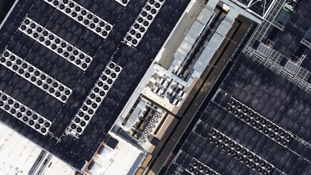 Hyperscale datacenter rooftop with solar panels and cooling units