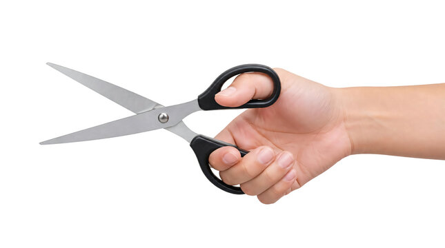 Hand holding silver scissors with black handles isolated on transparent background