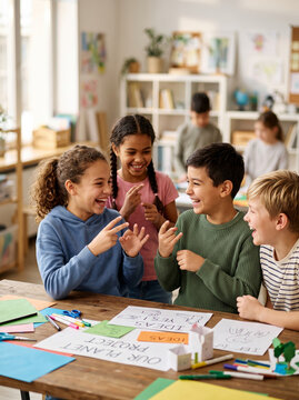 Children Learning Sign Language Gestures In Elementary Classroom
