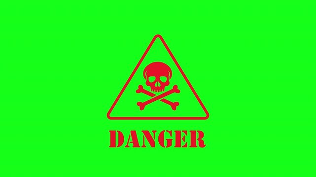 Danger sign icon with skull and crossbones on green screen background.