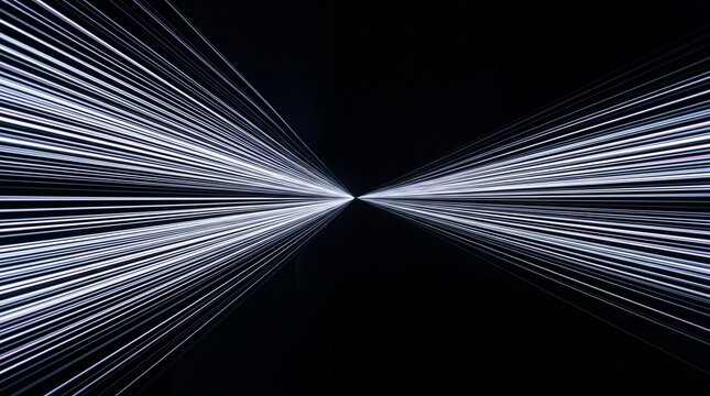 Abstract long-exposure style image of streaming light trails moving through darkness, thin parallel lines of white and pale blue converging toward a vanishing point