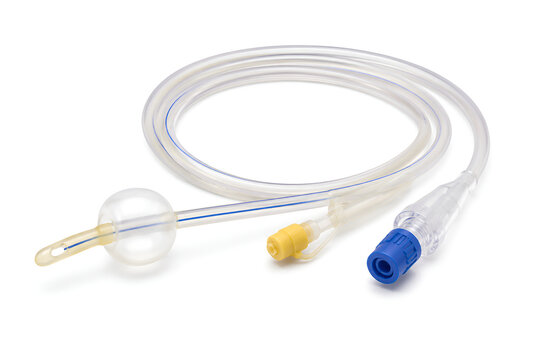 Foley Urinary Catheter with Balloon and Drainage Tubing Isolated on White Background