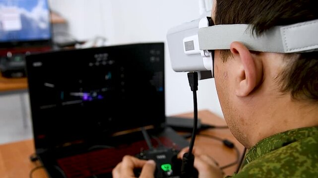 Drone control panel is in hand of military soldier