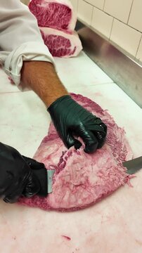 Chef Trimming Fat Cap and Cutting Fresh Raw A5 Wagyu Beef Steaks