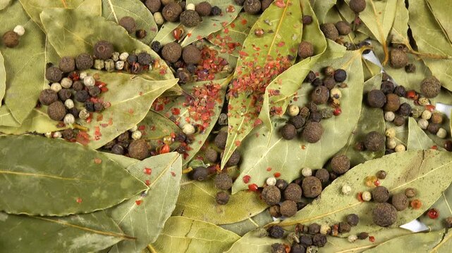 Dried  bay leaves, allspice, peppercorns, flat lay, food background, top view