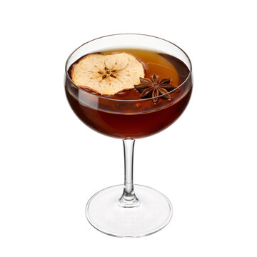 Autumn cocktail with dried apple and star anise in coupe glass