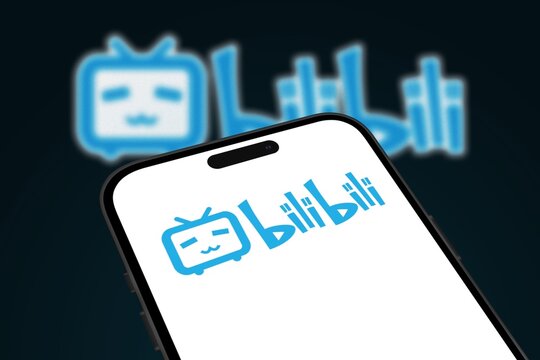 View on mobile phone screen with logo lettering of movie streaming service bilibili