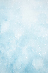 Naklejka premium A blue watercolor background with falling snow for designing winter holiday web banners