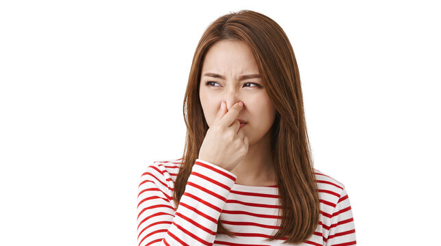 Disgusted Young Asian Woman Pinching Nose from Foul Smell, Isolated on White Background