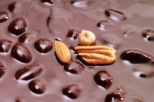 Nuts dipped into chocolate