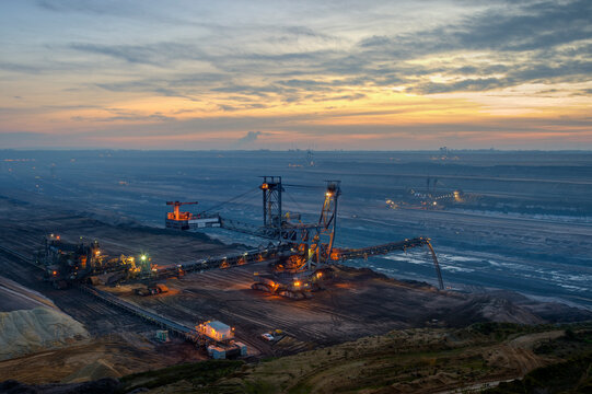Germany, North Rhine-Westphalia, Grevenbroich, Garzweiler surface mine, Stacker in the evening