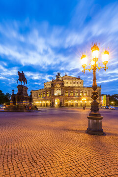 Germany, Dresden, Semper opera house with equestrian statue at blue hour
