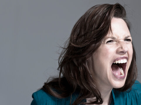 Woman screaming, portrait, close-up