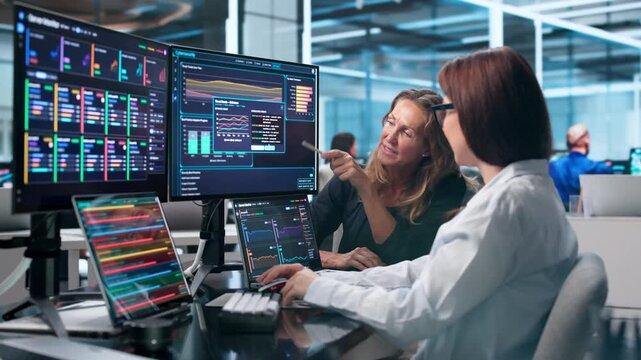 Woman Analyzes Network Threats On Her Laptop