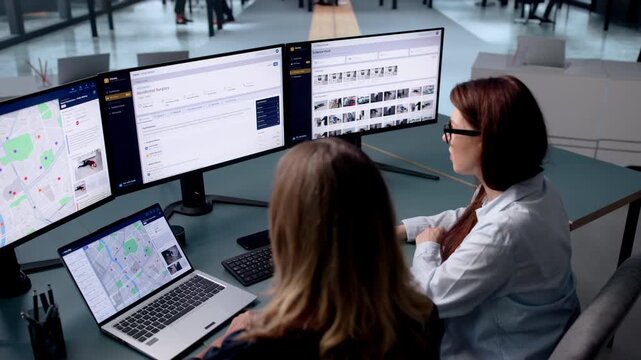 Young Woman Studies Crime Patterns On Laptop