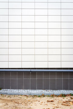 Modern white panel tile wall texture background. Architectural detail.
