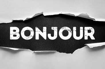 Word BONJOUR in bold distressed font. French greeting concept for communication, culture, travel, language learning, social interaction, positivity, and international connection © dizain