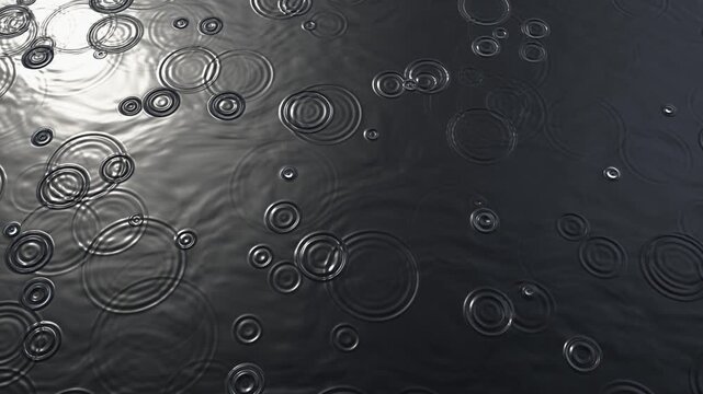 Raindrops falling on calm dark water creating expanding circular ripples with soft reflected daylight, moody seamless loop background with copy space