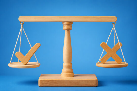 A wooden balance scale with a checkmark on one side and an 'X' on the other, set against a blue background.