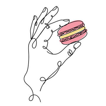 hand holding a pink and yellow French macaron cookie continuous line drawing
