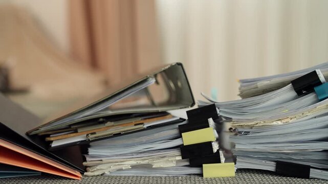 Scales of Justice with Legal Documents and Case Files in Law Office