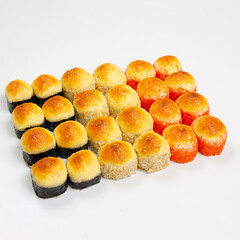 Assorted Baked Sushi Rolls Set on White Background © Дмитрий Ульянов