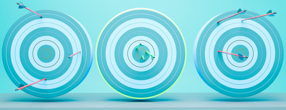 Business success concept with arrows hitting the bullseye while others miss