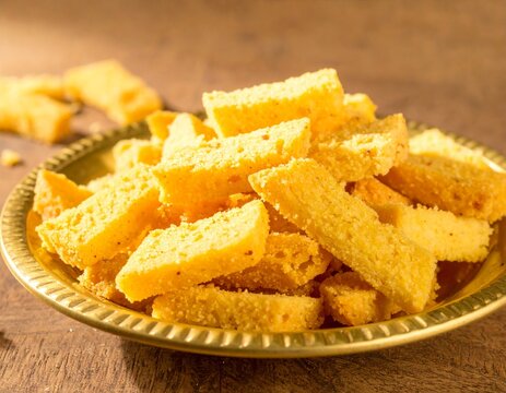 Traditional Golden Cake Rusk Pieces on a Decorative Plate