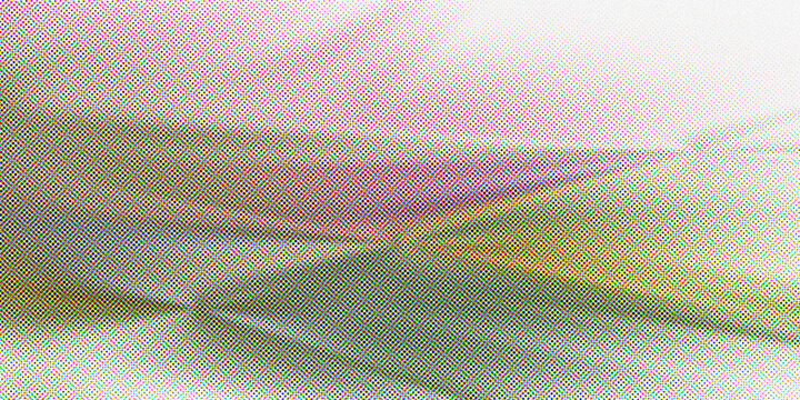 A close up view of a printed image showing distinct cmyk halftone dot pattern texture