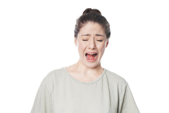 Young Woman Screaming in Fear and Disgust with Intense Emotional Facial Expression