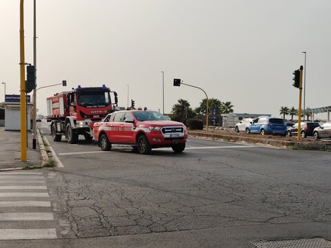Ostia, Rome, Italy - August 21, 2026, operational firefighter vehicle ready to respond, parked on the seafront.