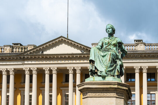 View of the Raczynski Library with its neoclassical columns and the Hygieia statue in the foreground in Poznan, Greater Poland Voivod, Poland.