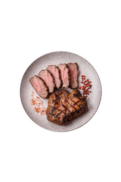 Grilled beef or pork steak seasoned with salt and allspice. Grilled steak