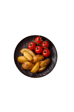 Fried potato wedges seasoned with salt and spices, ready for dinner table. Fried potato wedges