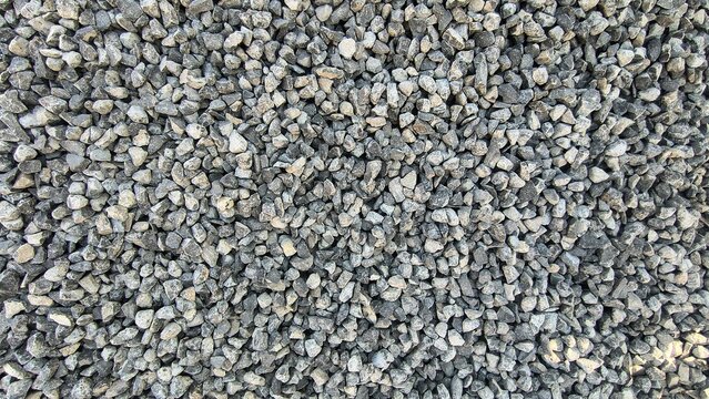 Full Frame Close Up of Crushed Grey Gravel Stone Texture Surface Background