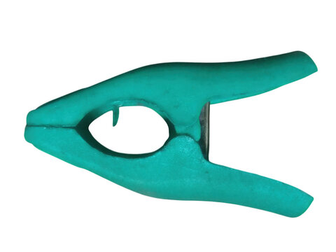 A single green plastic spring clamp tool for photography and workshop projects isolated on transparent background