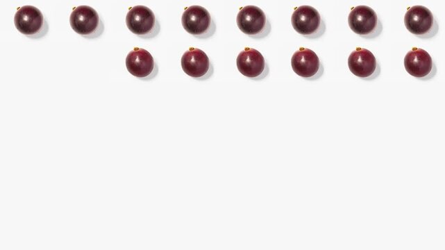 Fresh Purple Red Grapes Sliced Halves Falling Grid Pattern Pop Art Style Stop Motion Animation Abstract Food Commercial Background Video