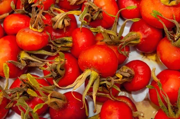 Closeup of Raw Ripe Orange Rosehip Berries. © troyka