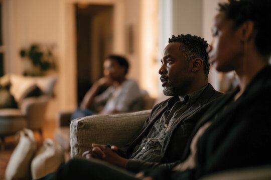 A group of friends engaging in a reflective conversation, seated in a warm and inviting space, emphasizing deep connections and thoughtful exchanges.