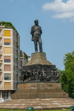 Bronze Statue of Composer Giuseppe Verdi Monument in Milan, Italy. Historic Statue on Sculpted Pedestal with Reliefs